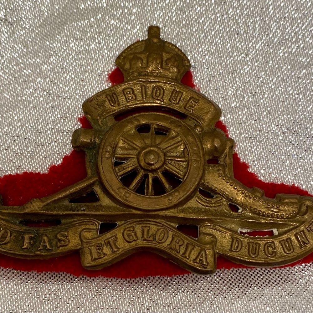 Vintage Royal Canadian Artillery  Cap Badge on red felt